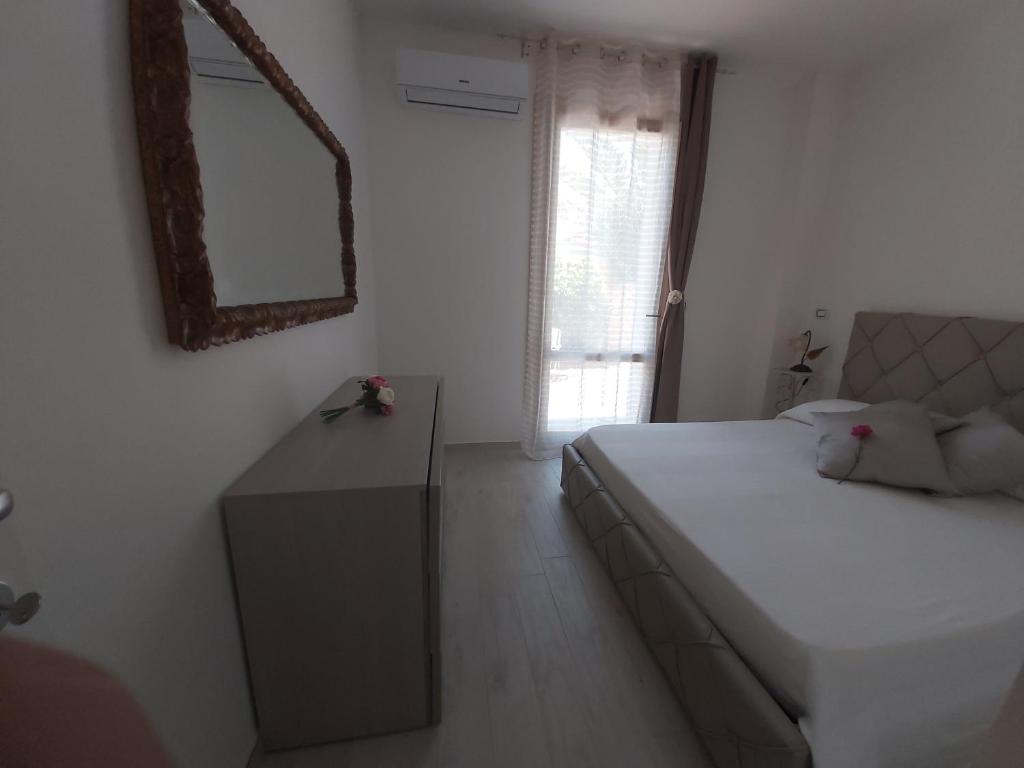 Postel nebo postele na pokoji v ubytování Eolie Residence