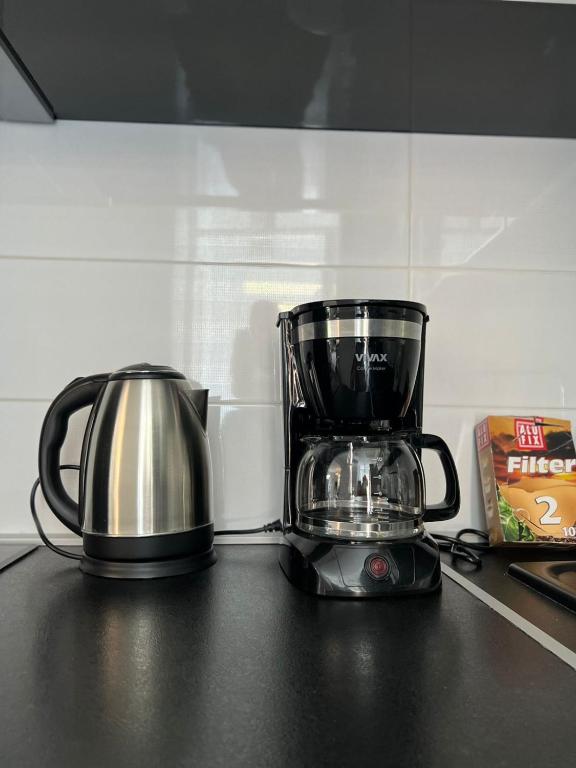 a coffee maker and a blender on a counter at Apartment Kiki in Kotor