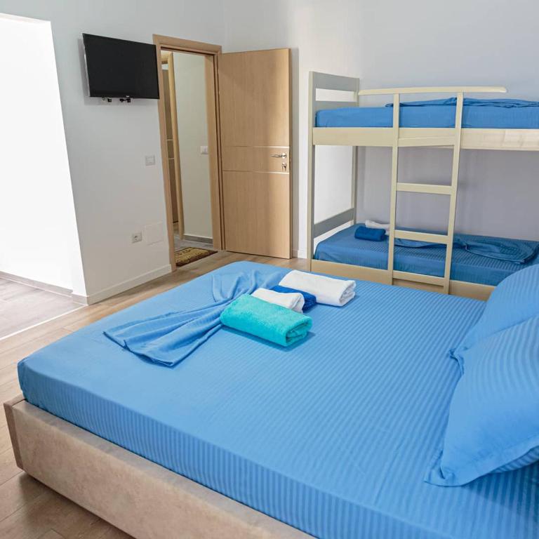Postel nebo postele na pokoji v ubytování Vila Brilant