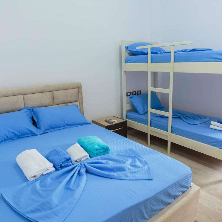 Postel nebo postele na pokoji v ubytování Vila Brilant
