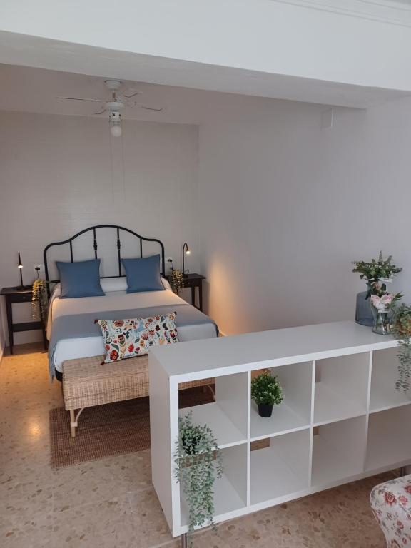 Postel nebo postele na pokoji v ubytování Nuevo loft el carpintero