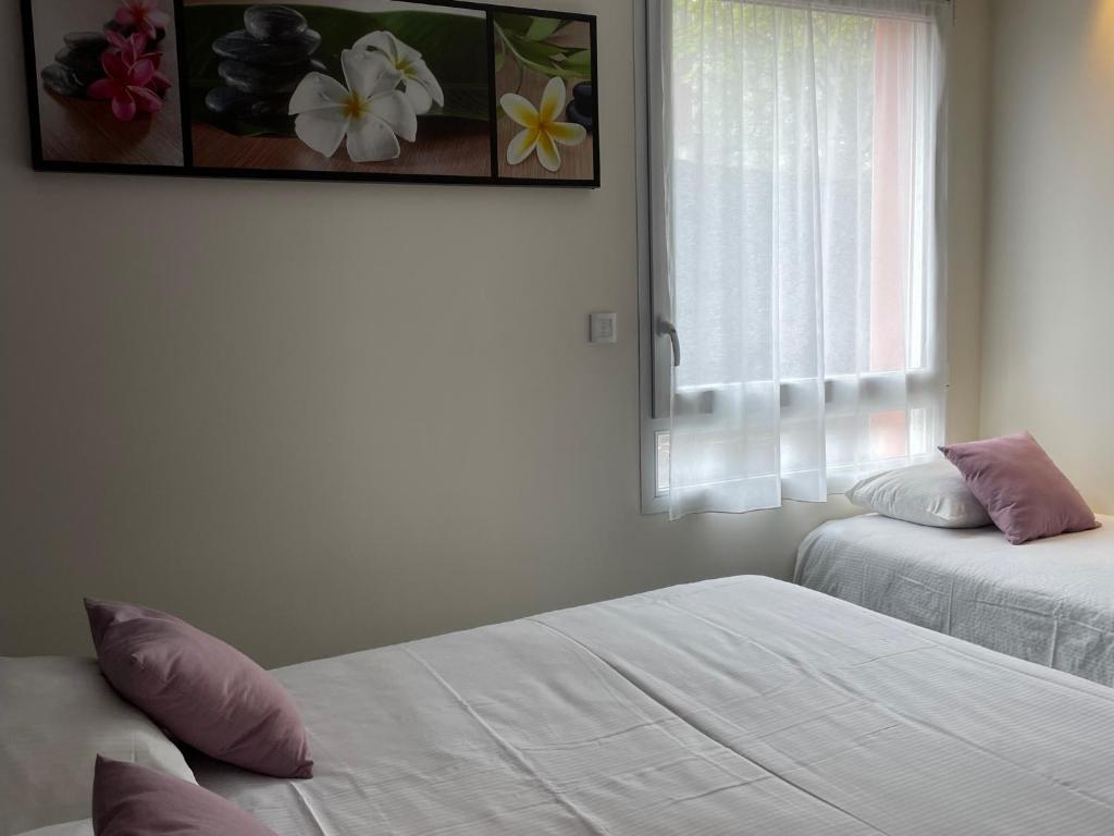 Postel nebo postele na pokoji v ubytování Kyriad Direct Limoges Nord