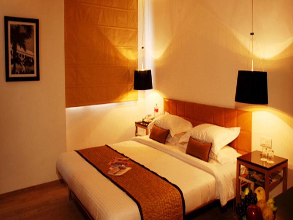 Postel nebo postele na pokoji v ubytování Hotel Palace Heights
