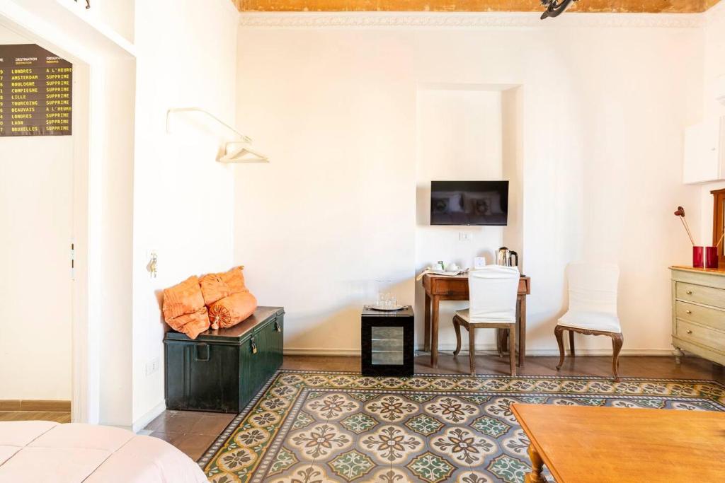 TV a/nebo společenská místnost v ubytování Binario 91 Rooms