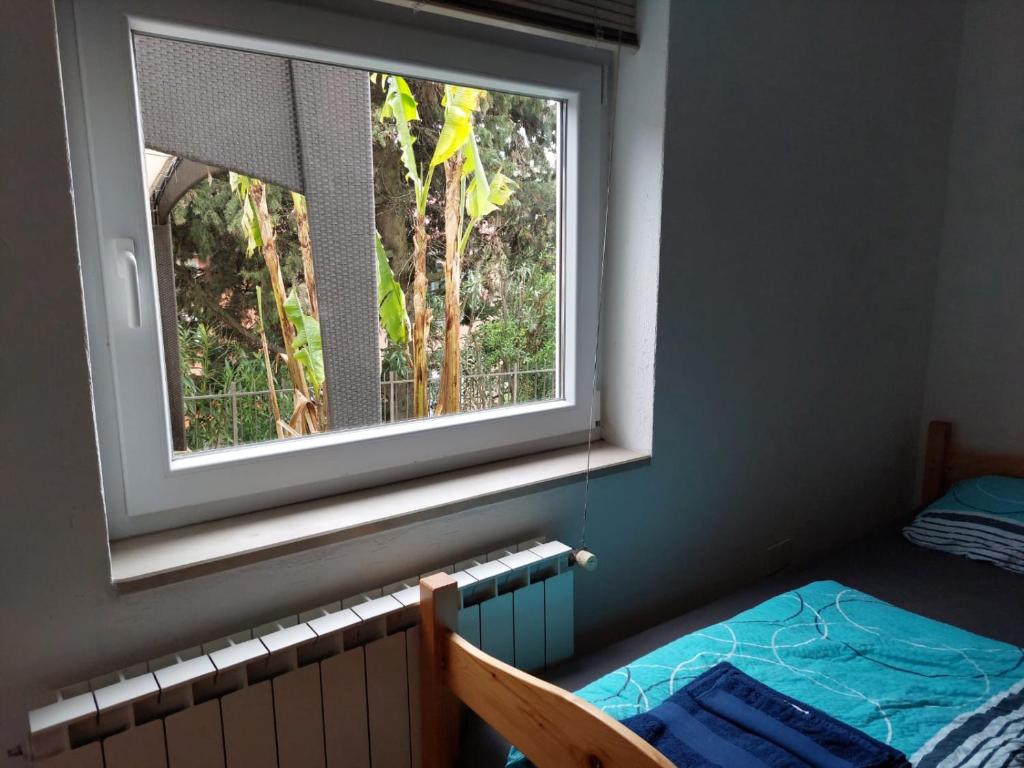 Postel nebo postele na pokoji v ubytování APARTMENT RAFAELLO
