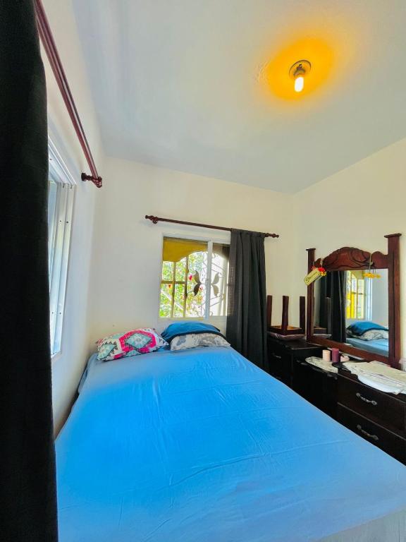 Postel nebo postele na pokoji v ubytování Tropical Bonilla Home