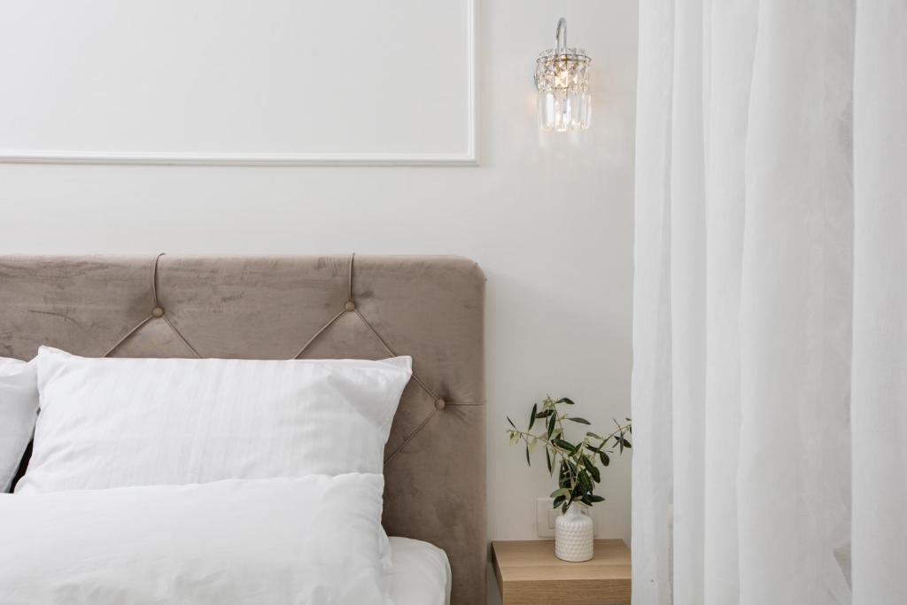 Postel nebo postele na pokoji v ubytování Apartman Marina