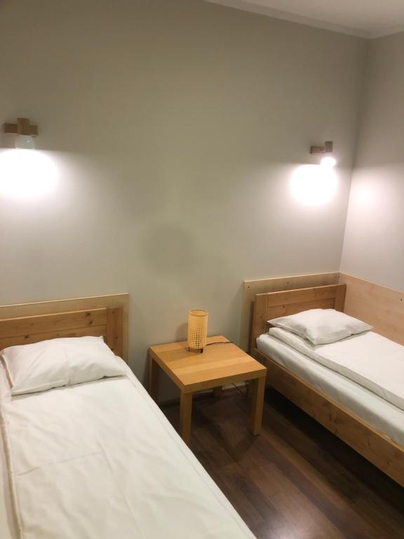Posteľ alebo postele v izbe v ubytovaní Śnieżka