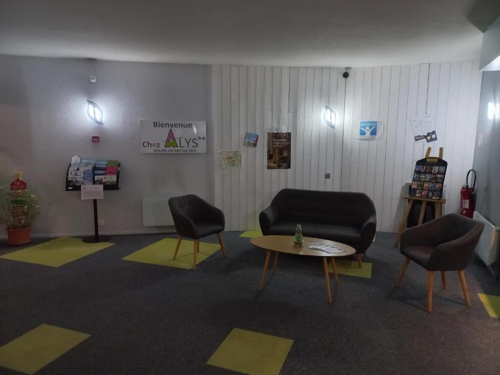Posezení v ubytování Contact Hôtel ALYS Bourg en Bresse Ekinox Parc Expo