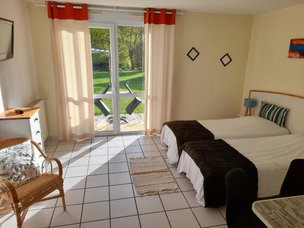 Postel nebo postele na pokoji v ubytování Hotel de l'Ile d'Amour
