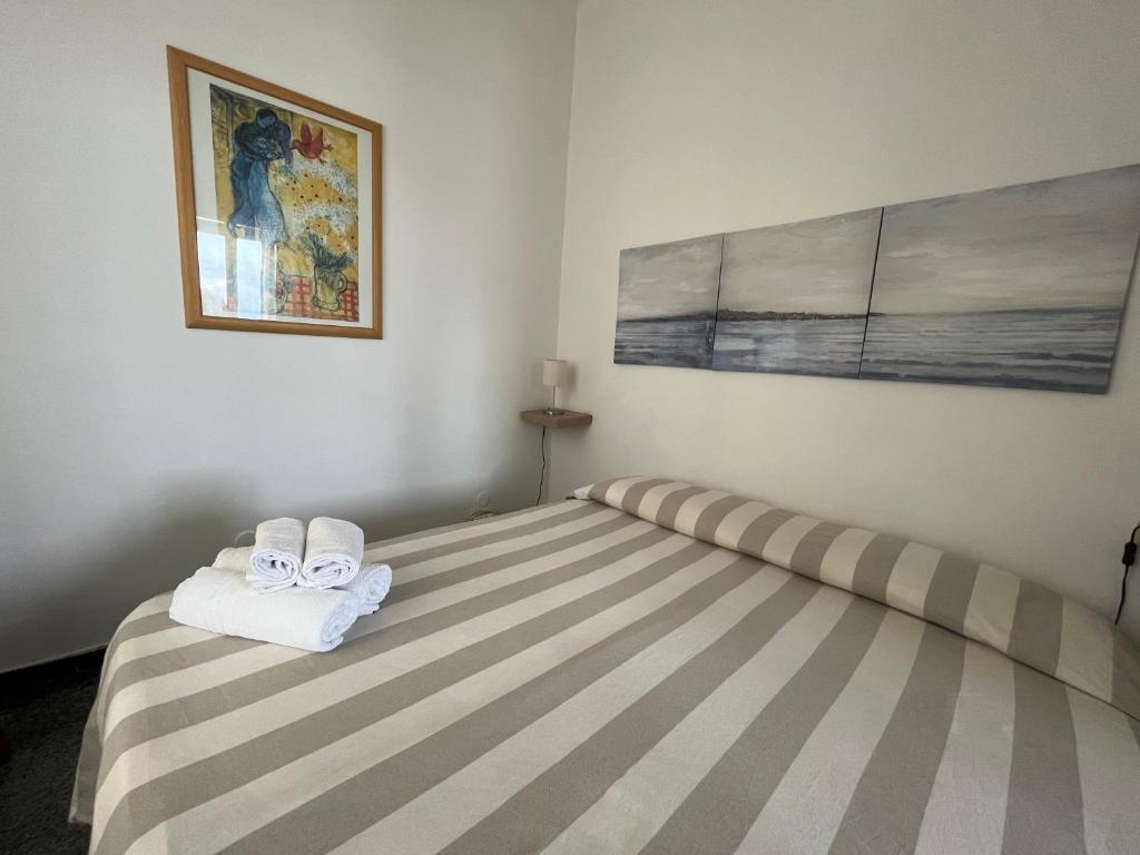 Postel nebo postele na pokoji v ubytování Piccolo Hotel di Lavagna