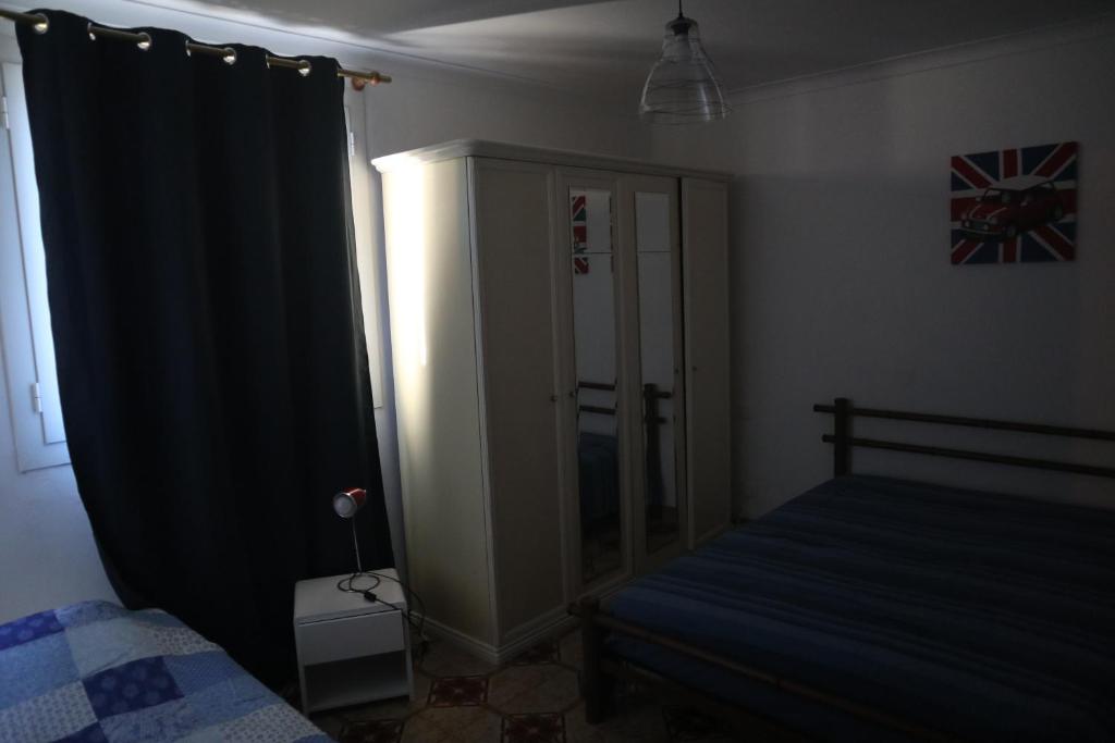 Posteľ alebo postele v izbe v ubytovaní Appartement dernier étage vue imprenable sur mer