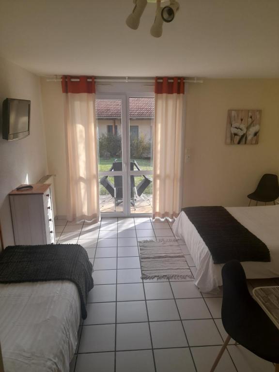 Postel nebo postele na pokoji v ubytování Hotel de l'Ile d'Amour