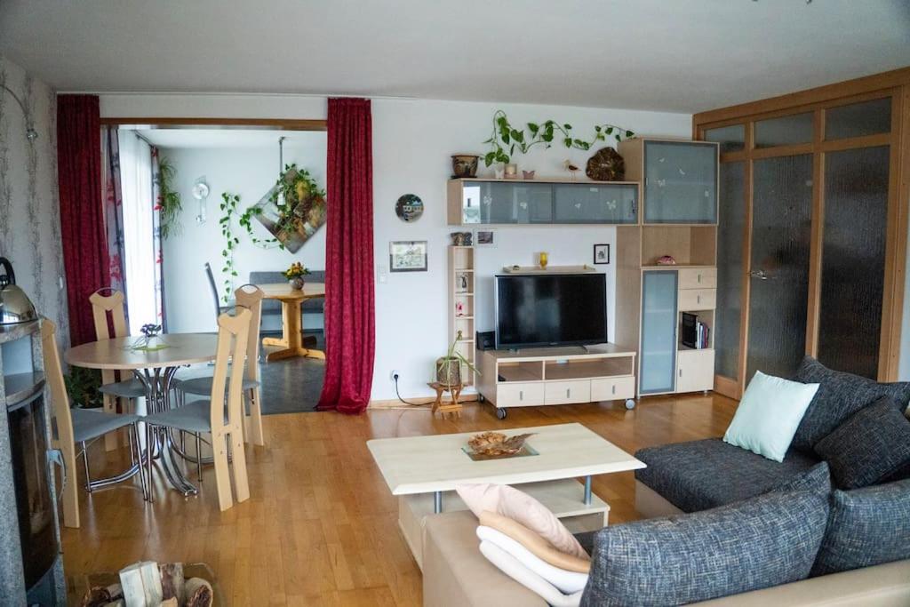 Posezení v ubytování Urlaub mit verglaster Terrasse