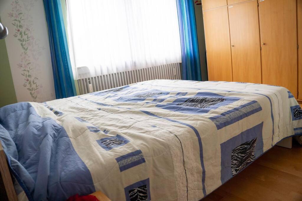 Postel nebo postele na pokoji v ubytování Urlaub mit verglaster Terrasse