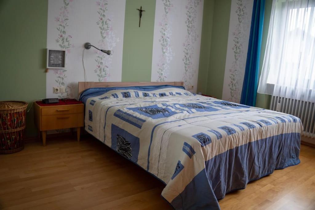 Postel nebo postele na pokoji v ubytování Urlaub mit verglaster Terrasse