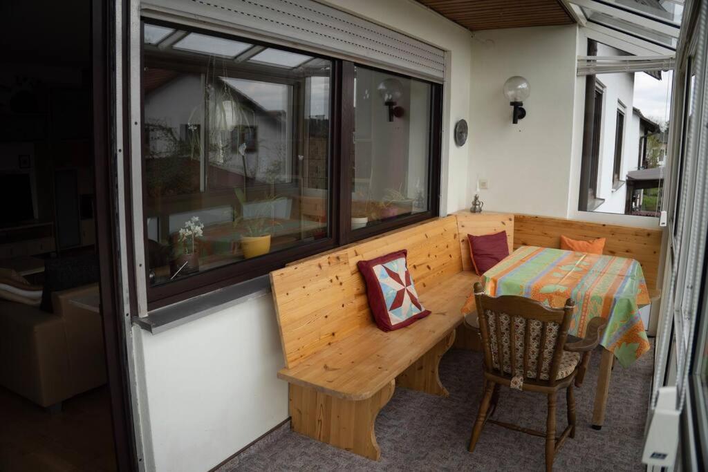 Posezení v ubytování Urlaub mit verglaster Terrasse
