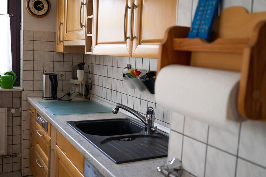 Kuchyň nebo kuchyňský kout v ubytování Urlaub mit verglaster Terrasse