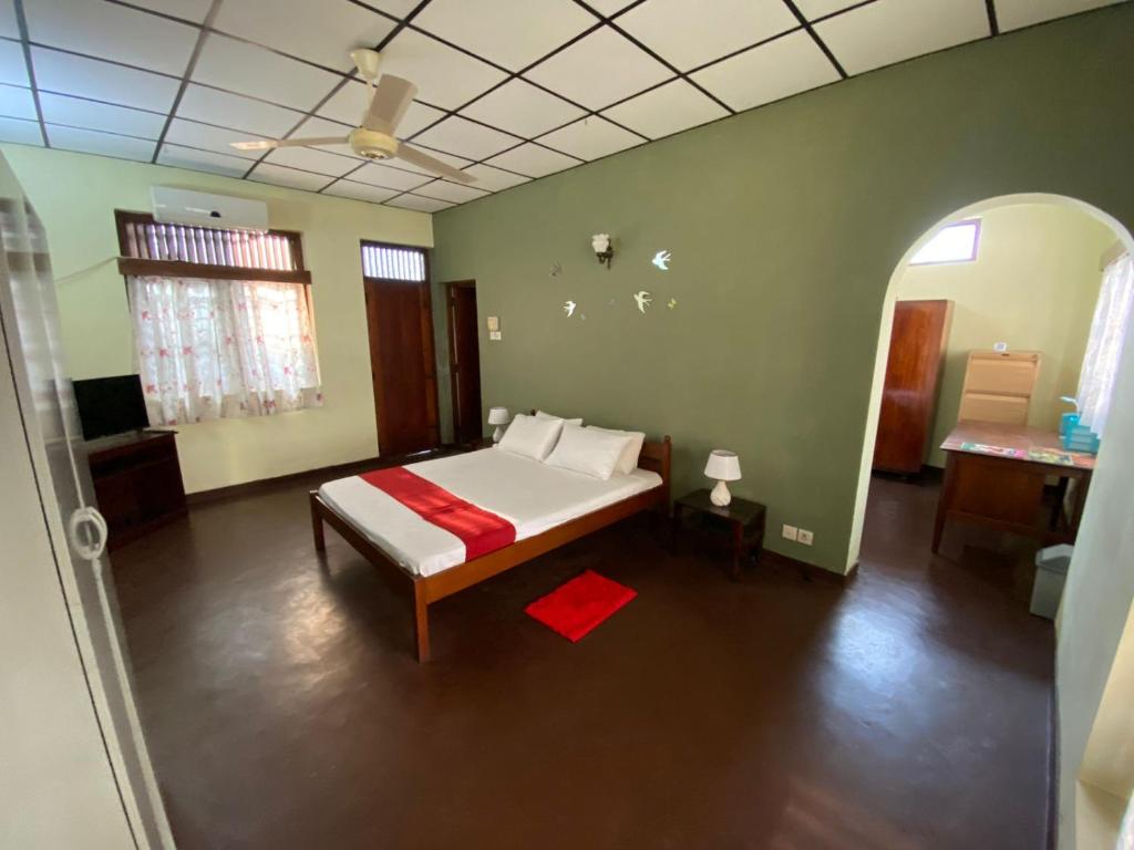 Postel nebo postele na pokoji v ubytování Oasis Colombo
