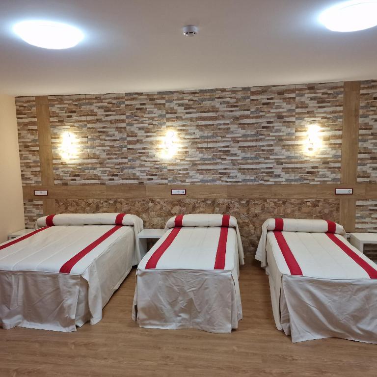 Postel nebo postele na pokoji v ubytování Gavilanes 2 TOLEDO