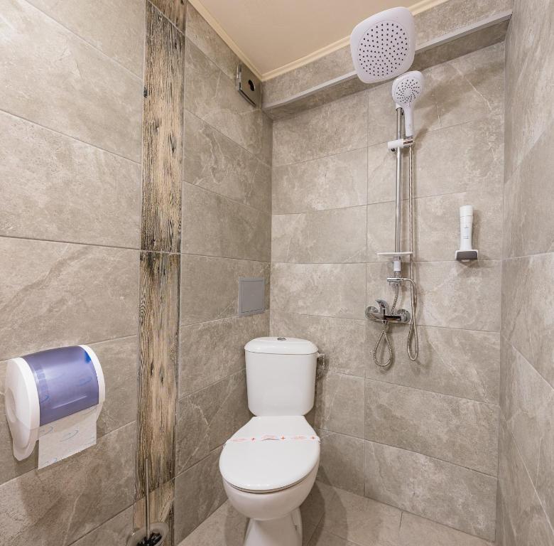 Koupelna v ubytování Lecardo Hotel