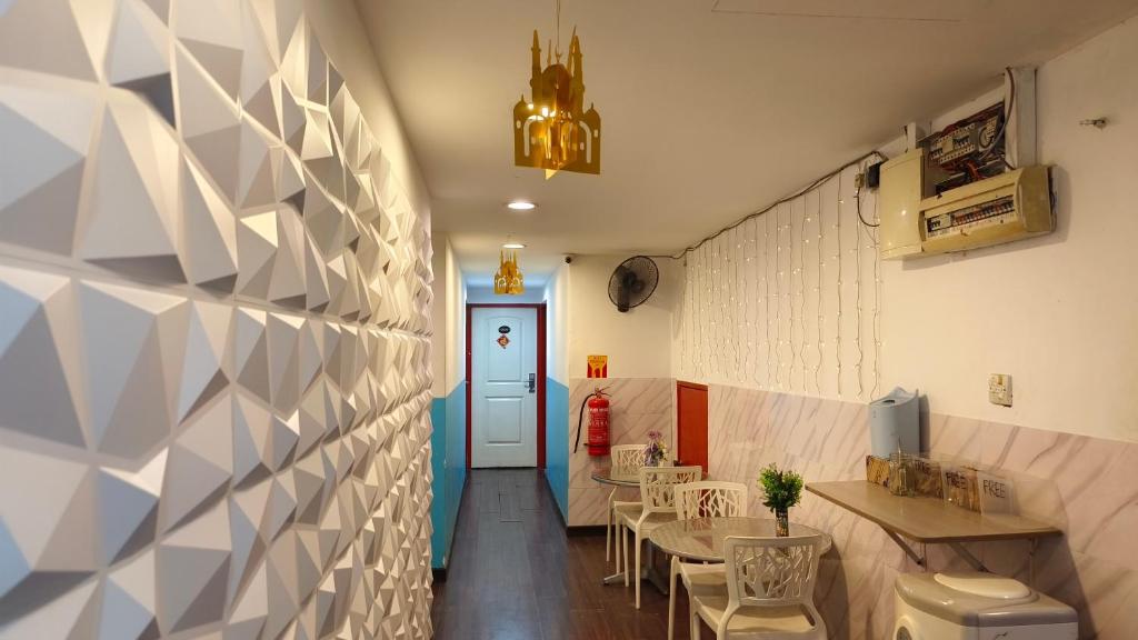 Posezení v ubytování 1st Inn Hotel Klang Sentral Meru