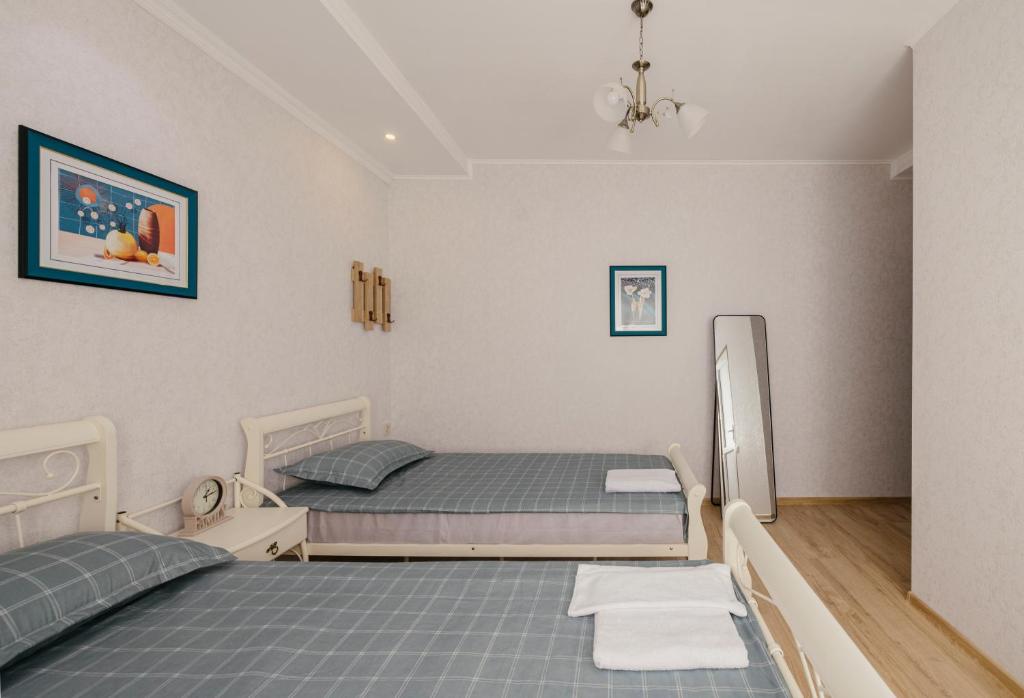 Postel nebo postele na pokoji v ubytování Marcos Hotel