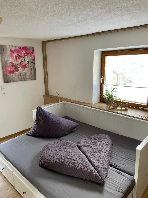 Postel nebo postele na pokoji v ubytování Apart schöne Aussicht