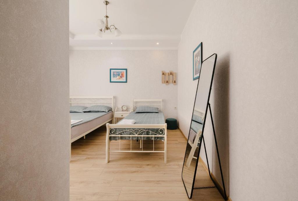 Postel nebo postele na pokoji v ubytování Marcos Hotel