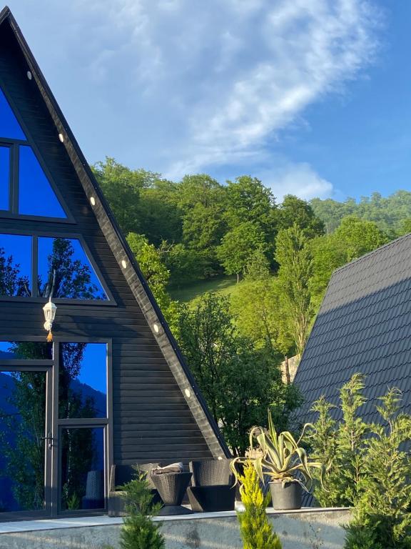 a house with a view of the mountains at A Frame Lerik in Lerik