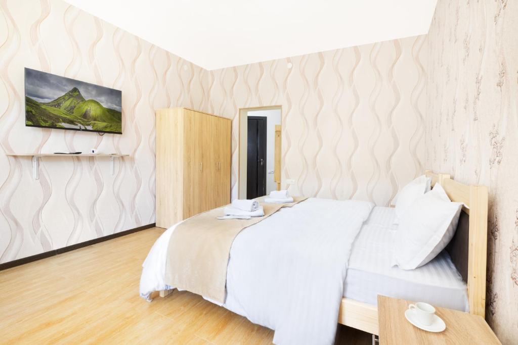 Postel nebo postele na pokoji v ubytování Kompozitor Hotel Dilijan