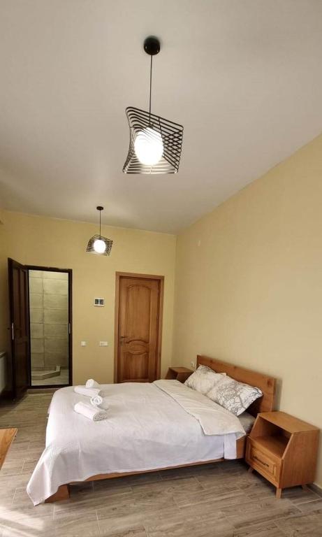 Postel nebo postele na pokoji v ubytování Hotel Canionel