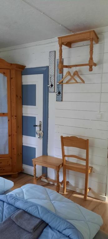 Postel nebo postele na pokoji v ubytování Davids Stuga