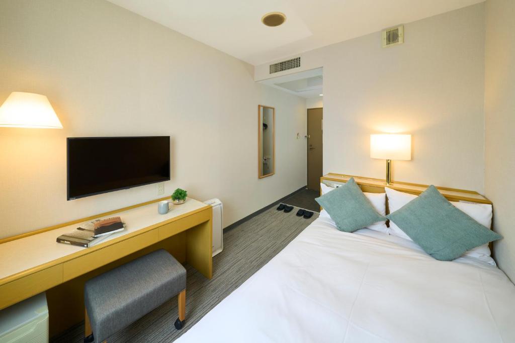 TV a/nebo společenská místnost v ubytování Hotel Resol Machida