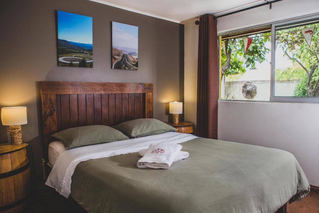 Tempat tidur dalam kamar di Casa Suiza