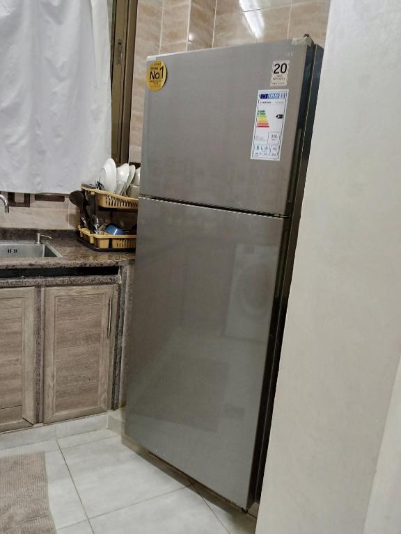Kuchyň nebo kuchyňský kout v ubytování Jerash air apartment