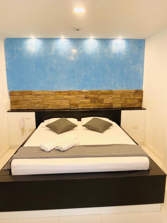 Postel nebo postele na pokoji v ubytování Hotel Paradisus