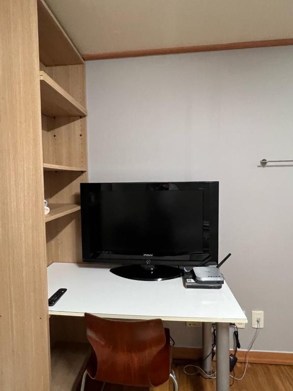 TV a/nebo společenská místnost v ubytování Sangmin Sweet