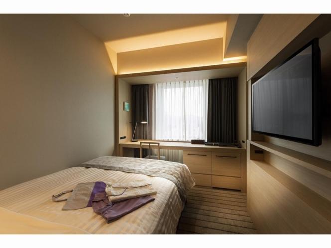 Postel nebo postele na pokoji v ubytování HOTEL OLE INN
