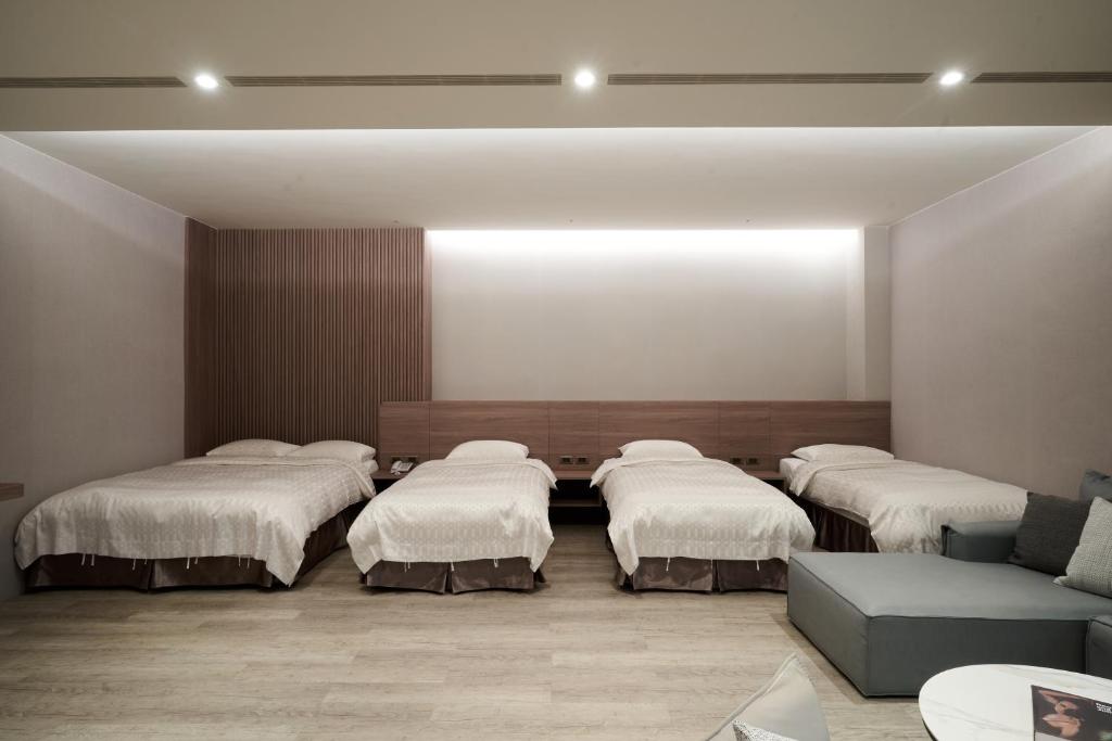 Yung An Business Hotel客房内的一张或多张床位