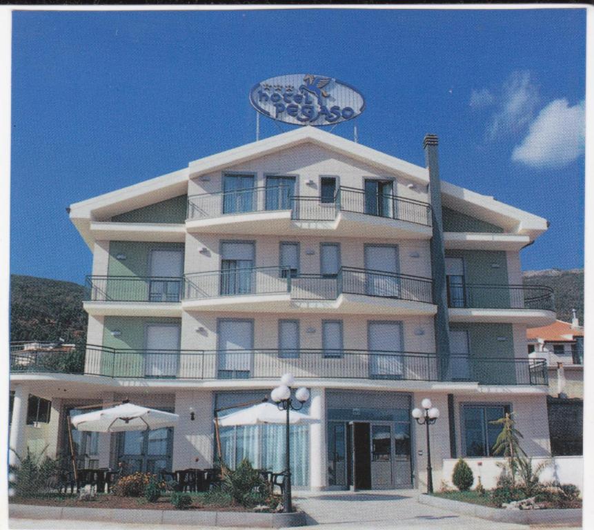 a building with an antenna on top of it at Hotel Pegaso in San Giovanni Rotondo