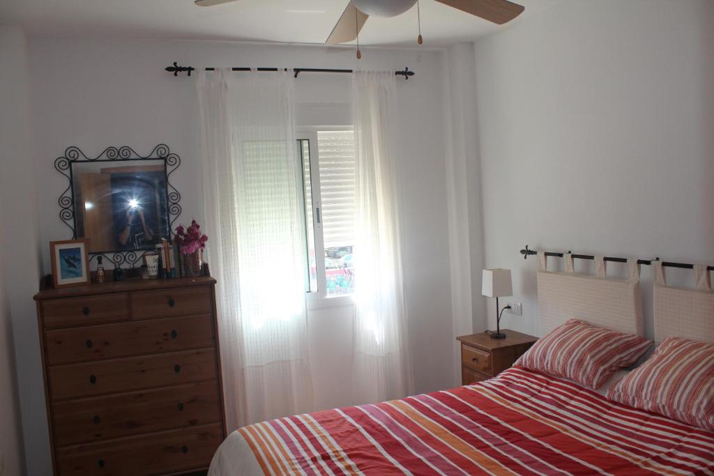 Posteľ alebo postele v izbe v ubytovaní Apartamento en Vera Playa