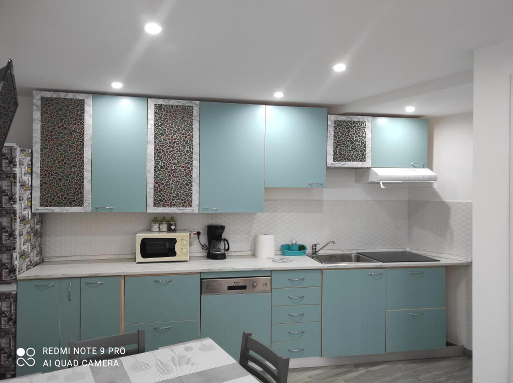 A kitchen or kitchenette at Casa Mario