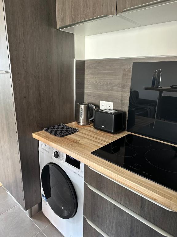 Kuchyňa alebo kuchynka v ubytovaní La maison Baz
