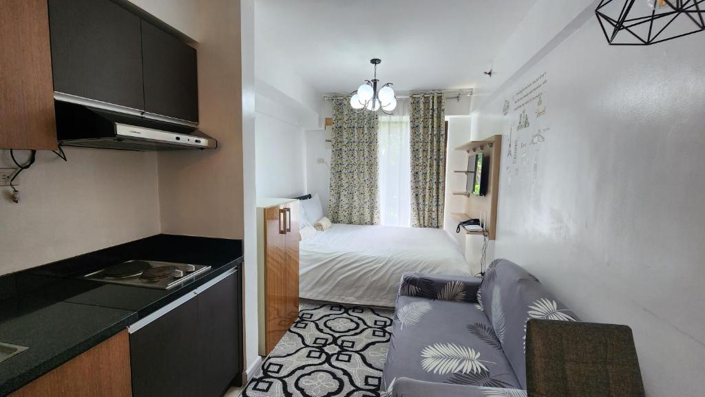 Postel nebo postele na pokoji v ubytování NORTHPOINT CONDO Free Airport Pick Up for 3 nights stay or more