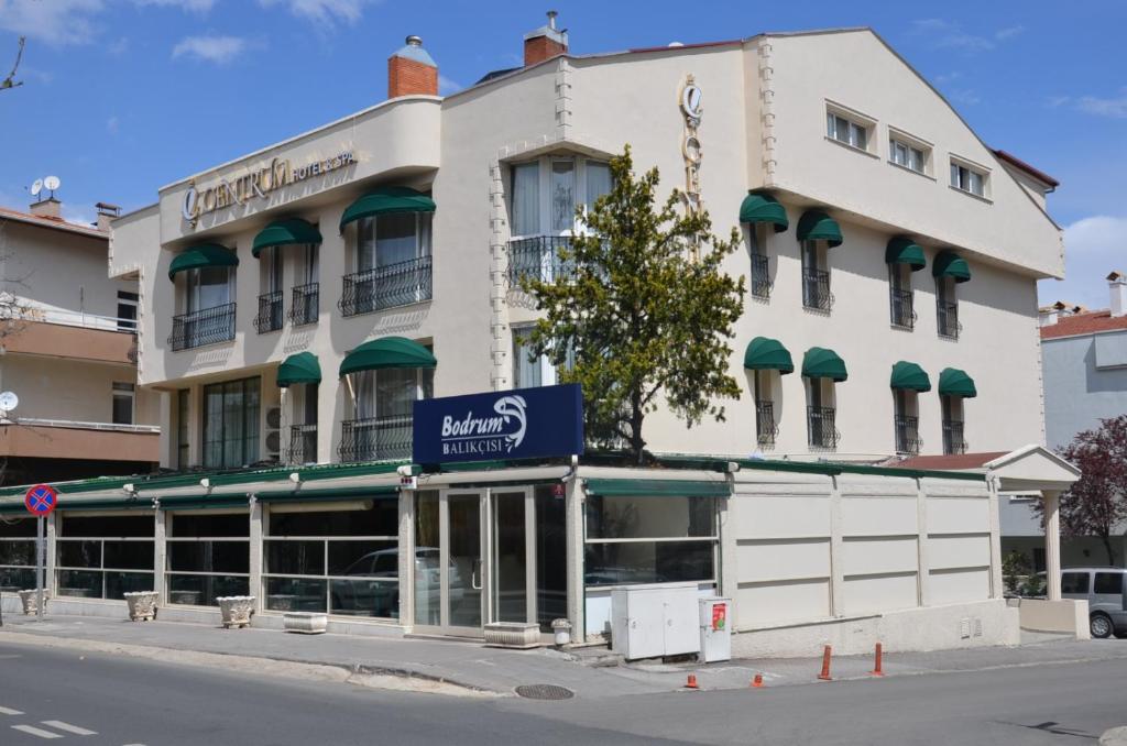 a hotel on the corner of a street at Centrum Hotel in Ankara