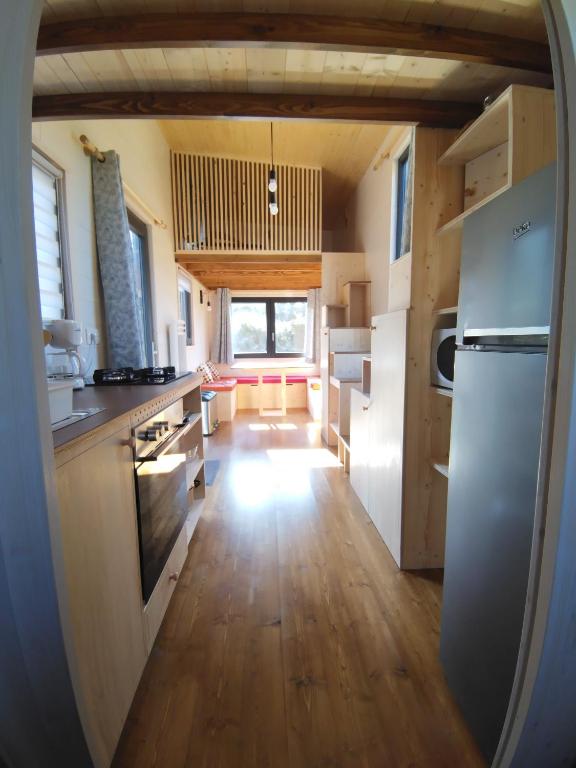 Kuchyň nebo kuchyňský kout v ubytování Camping Les Granges Bas - Tiny House - Lodges - Mobilhomes