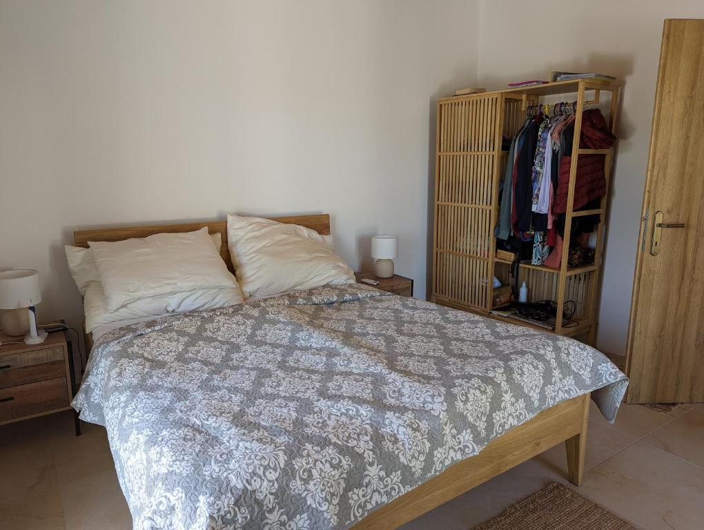 Postel nebo postele na pokoji v ubytování Almyros Garden House