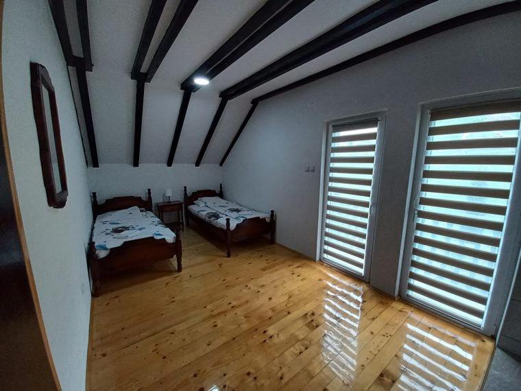 Postel nebo postele na pokoji v ubytování Vila Bogicevic