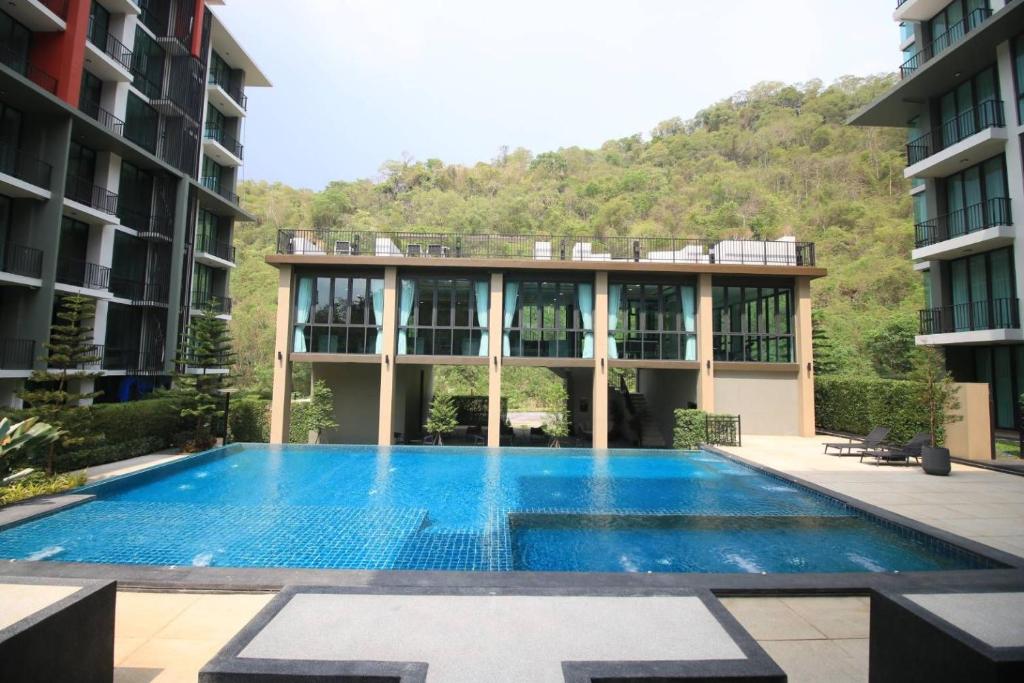 Bazén v ubytování Execlusive Suite 209 by Forest Khaoyai nebo v jeho okolí